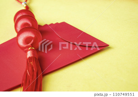 Side view of Chinese New Year red packet with customizable space for text or wishes. Chinese New Year celebration concept. 110749551