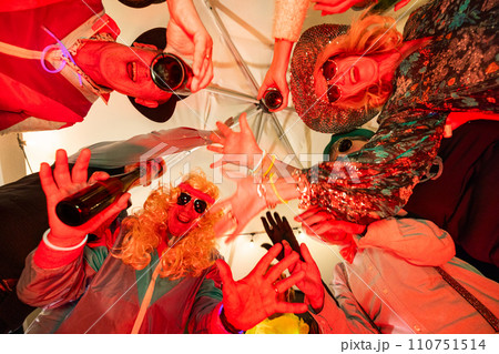 Carnival of Cheers: Jubilant Toast Under Festive Lights Carnival of Cheers: Jubilant Toast Under Festive Lights 110751514