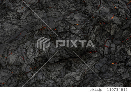 Aerial view of the texture of a solidifying lava field, close-up 110754612