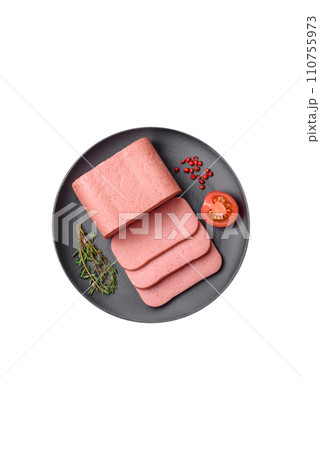 Delicious canned pink ham with salt, spices and herbs 110755973