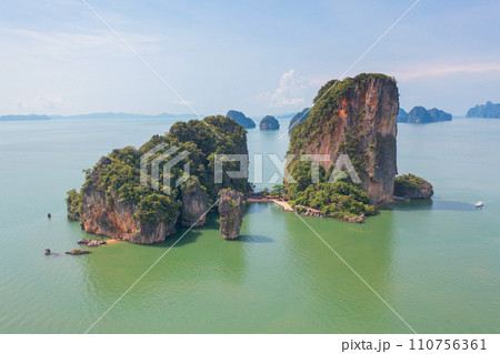 Aerial top view of Khao Phing Kan, Ko Ta Pu, Phang Nga, lush green trees from above in tropical forest in national park in summer season. Natural landscape background. 110756361