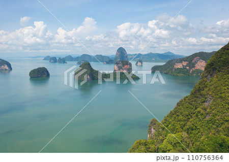Aerial top view of Khao Phing Kan, Ko Ta Pu, Phang Nga, lush green trees from above in tropical forest in national park in summer season. Natural landscape background. 110756364