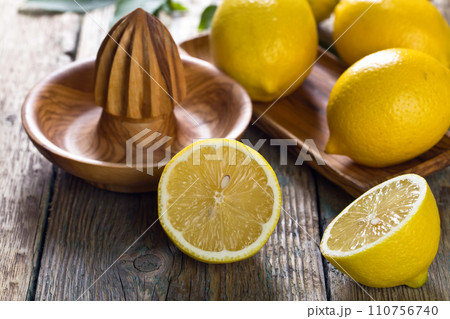 Lemons and squeezer . Lemons and squeezer . 110756740