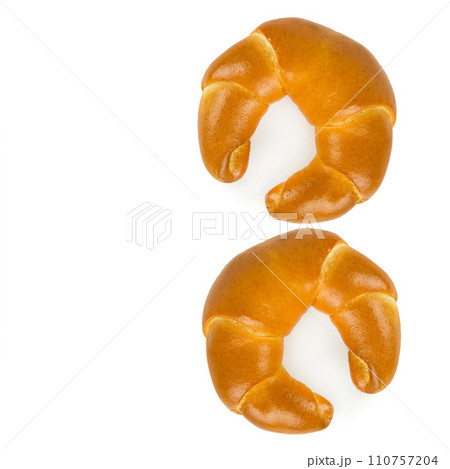 Croissants isolated on a white. Free space for text. Croissants isolated on a white. Free space for text. 110757204