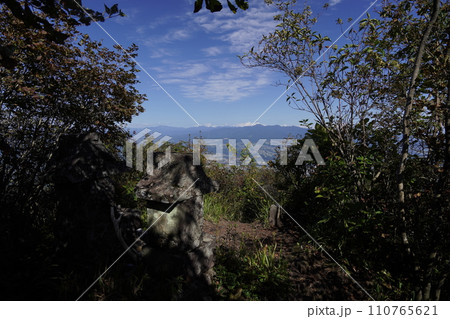 群馬県渋川市　水沢山山頂付近の石祠から赤城山方面を見る　2023年10月2日 110765621