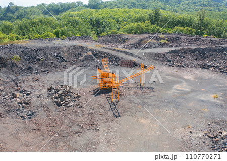 Aerial top view of ground in the land with sand in factory industry for construction site. Arid pattern texture background. Bulldozer tractor Aerial top view of ground in the land with sand in factory industry for construction site. Arid pattern texture background. Bulldozer tractor 110770271