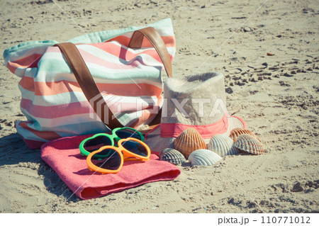 Colorful accessories using for relax on beach. Travel and vacation time Colorful accessories using for relax on beach. Travel and vacation time 110771012
