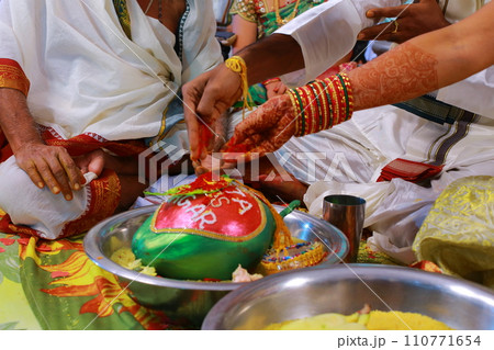 Prayer at Traditional Hindu wedding ceremony 110771654