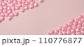 pink hearts on pink background 110776877