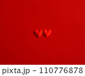 red hearts on red background 110776878