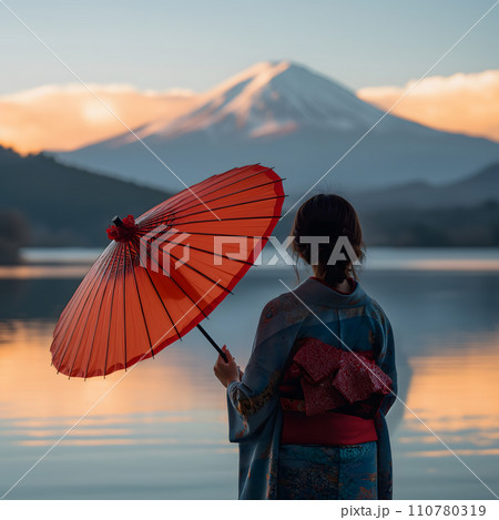 Woman wearing a kimono, holding a red umbrella, stands in front of Mount Fuji. By the lake, Woman wearing a kimono, holding a red umbrella, stands in front of Mount Fuji. By the lake, 110780319