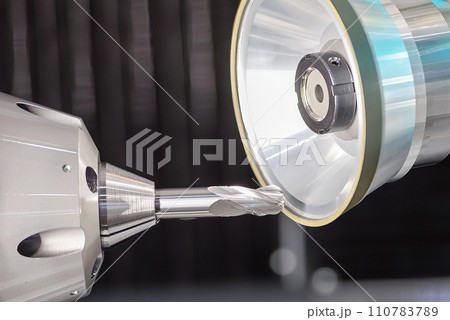 Close up scene the ball nose end mill tool regrinding process on regrinding machine. 110783789