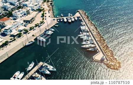 Airview of small yachts moored at jetty in Naoussa port, Greece 110787510