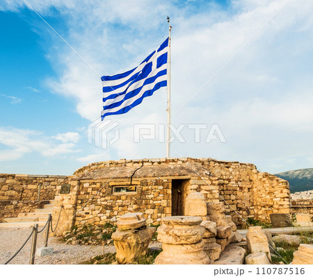 Greek flag waving against blue sky Greek flag waving against blue sky 110787516
