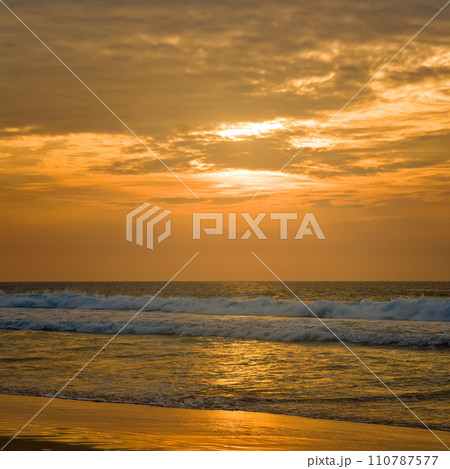 Tropical beach, sea and bright sunset. Tropical beach, sea and bright sunset. 110787577