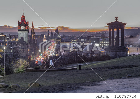 Aerial view at dusk of the Royal Mile or High Street in Edinburgh Old Town from the hilltop of Calton Hill. Aerial view at dusk of the Royal Mile or High Street in Edinburgh Old Town from the hilltop of Calton Hill. 110787714