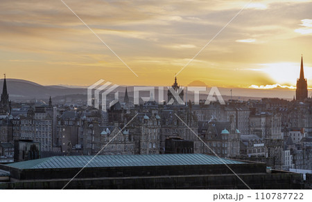 Cityscape view of the old town district of Edinburgh City at sunset. Cityscape view of the old town district of Edinburgh City at sunset. 110787722