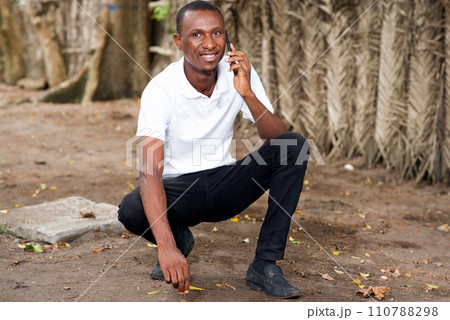 young man talking on the phone 110788298