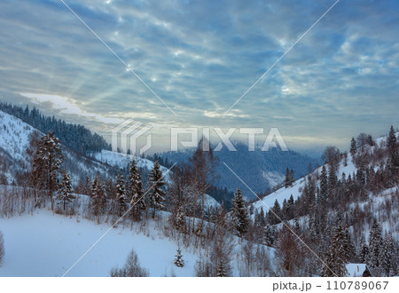 Sunset winter Ukrainian Carpathian Mountains landscape. 110789067