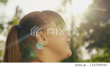 portrait smiling girl, looking sky, smile face child kid girl, child face rays sunlight, child close-up children playground, bokeh background sunset flare, family girl daughter happy dream, face sky portrait smiling girl, looking sky, smile face child kid girl, child face rays sunlight, child close-up children playground, bokeh background sunset flare, family girl daughter happy dream, face sky 110790942