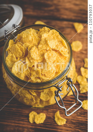 Corn flakes in a glass jar Corn flakes in a glass jar 110793037