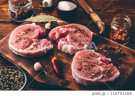 Pork loin steak with different spices 110793164