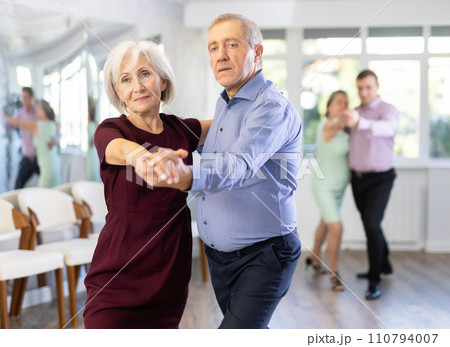 Elderly man and elderly woman dance tango Elderly man and elderly woman dance tango 110794007