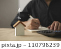 The growth of investment in real estate. Future planning Including financial planning and long-term investments. Small wooden house model 110796239