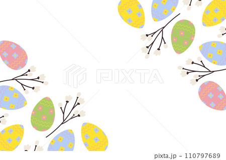 Easter corner frame with top and bottom border of vibrant painted eggs and spring twigs. Copy space 110797689