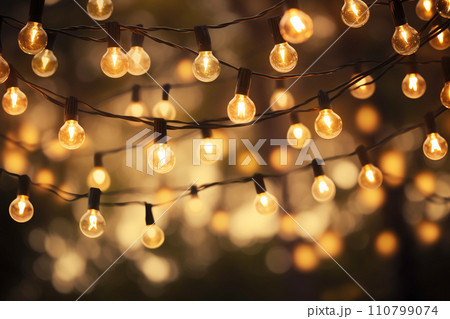 a string of lights hanging on the tree bokeh style background with generative ai a string of lights hanging on the tree bokeh style background with generative ai 110799074