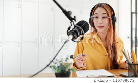 Live Podcast Session with Smiling Female Host. Live Podcast Session with Smiling Female Host. 110799678