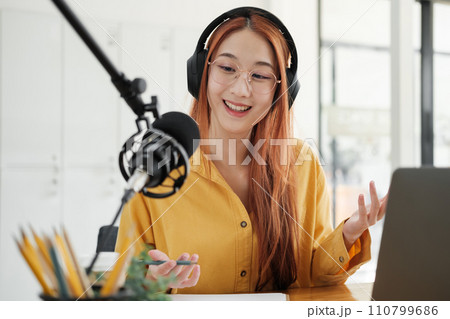 Live Podcast Session with Smiling Female Host. 110799686