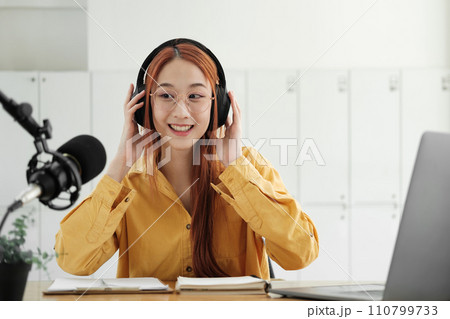 Live Podcast Session with Smiling Female Host. 110799733