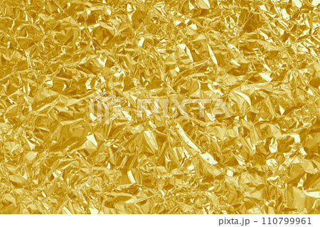 Gold foil leaf shiny texture, abstract yellow wrapping paper for background and design art work. Gold foil leaf shiny texture, abstract yellow wrapping paper for background and design art work. 110799961