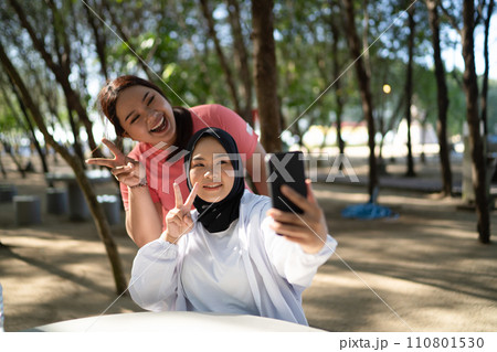 asian women sportswear taking picture selfie asian women sportswear taking picture selfie 110801530