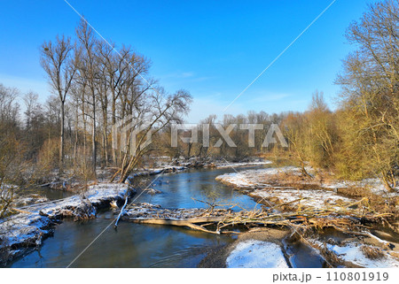 River floodplain delta winter snow meander drone aerial inland video shot in sandy sand alluvium freezing cold frost, benches forest and lowlands wetland swamp, quadcopter view flying fly flight show River floodplain delta winter snow meander drone aerial inland video shot in sandy sand alluvium freezing cold frost, benches forest and lowlands wetland swamp, quadcopter view flying fly flight show 110801919