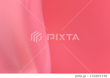 ピンク背景にドレープのような模様が入ったシンプルな背景素材 110803146