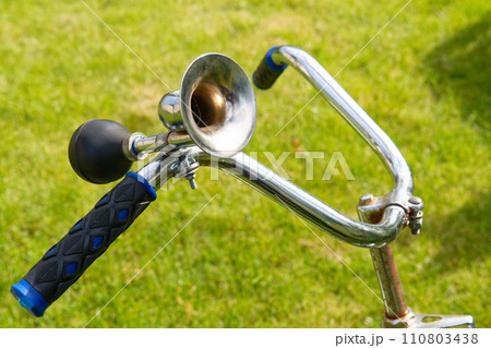 Vintage bicycle horn on handlebar Vintage bicycle horn on handlebar 110803438