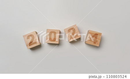 Wooden cube blocks with 2024 text on white background. New year business vision, goals and plans 110803524