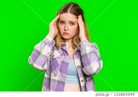 Young woman rubbing temples to cure headache problem, suffering from tension and migaine stress pain Young woman rubbing temples to cure headache problem, suffering from tension and migaine stress pain 110805049