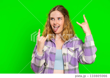 Happy woman showing rock n roll gesture by hands, cool sign, crazy expression dancing, victory, win Happy woman showing rock n roll gesture by hands, cool sign, crazy expression dancing, victory, win 110805066