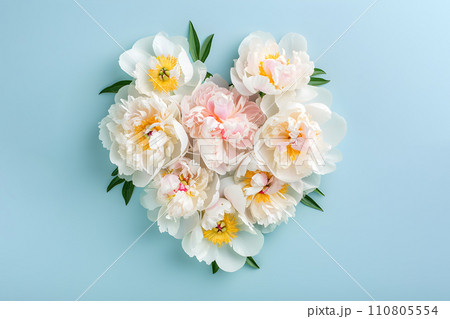 AI-generated content. Celebration concept - flowers arranged in heart shape, top view 110805554