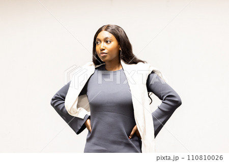 Confident Stance: Aspiring Businesswoman in Modern Attire 110810026
