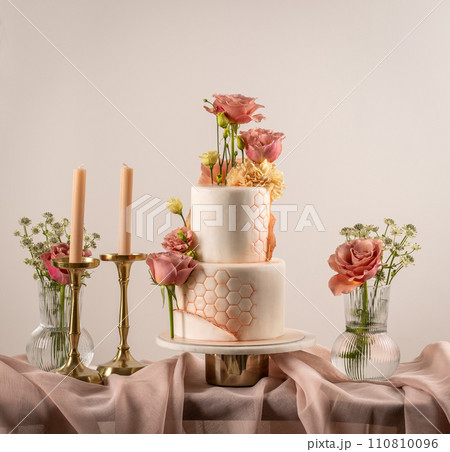 Peach fuzz coloured wedding cake 110810096