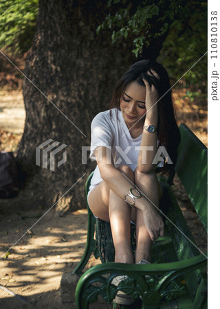 Recession Stress Woman using laptop work hard at home office outdoor in green park. Young women have headache, depressed from failure business burnout. Tired Asian woman despair sadness problems Recession Stress Woman using laptop work hard at home office outdoor in green park. Young women have headache, depressed from failure business burnout. Tired Asian woman despair sadness problems 110810138