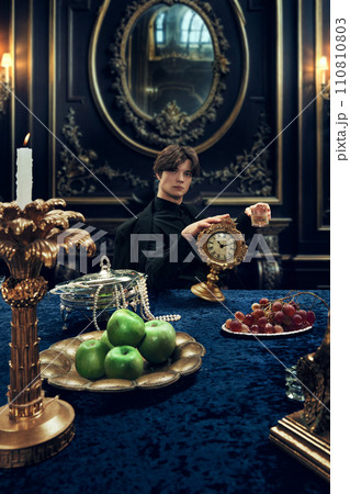 Marketing images for antique store or auction house. Men's fashion magazine, highlighting formal clothes. 110810803