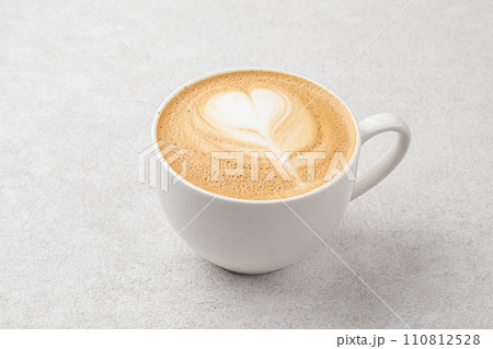 White cup of hot coffee with milk White cup of hot coffee with milk 110812528