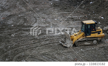 Kiev, Ukraine March 13, 2019:  Tractors and excavators work on the construction of the foundation zero cycle 110813182