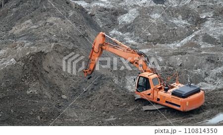 Kiev, Ukraine, October 17, 2018: Workers in the mud of a construction site at the stage of excavation; construction of a supermarket AUCHAN 110814350