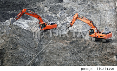 Kiev, Ukraine, October 17, 2018: Workers in the mud of a construction site at the stage of excavation; construction of a supermarket AUCHAN 110814356
